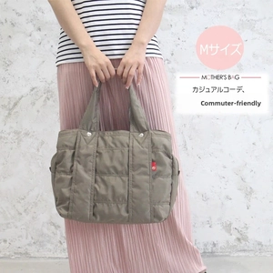 Quilted nylon mother's bag in khaki green with side label detail shown in size M