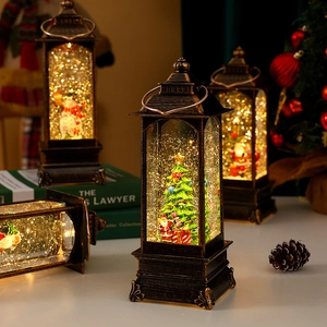 Vintage Christmas lantern snow globe with LED lights and glowing glitter scene