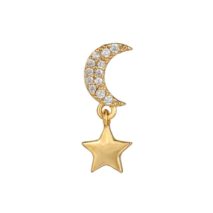 Close-up of gold star and moon earrings with sparkling white pavé set zircon crystals
