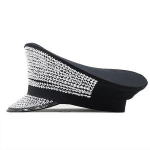Side view of black flat top military hat with silver rhinestones and glossy brim detail