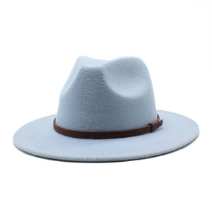Close-up of light blue wool fedora hat featuring a brown leather band and stitch detail