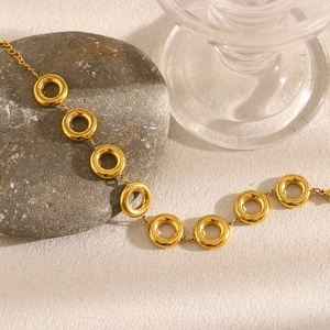 Minimalist 18K gold plated stainless steel chunky link bracelet on natural stone base