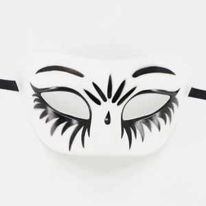 White Mexican Day of the Dead half mask with black floral patterns and eyelashes