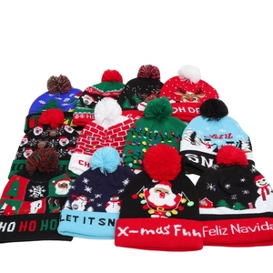 Colorful LED light-up Christmas beanies featuring reindeer and festive patterns
