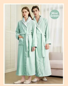 Close-up of pea green flannel bathrobe with white contrast trim and soft warm texture