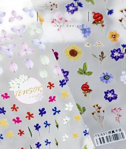 Detail of TS-637 floral nail art stickers with sunflowers and violets on adhesive film