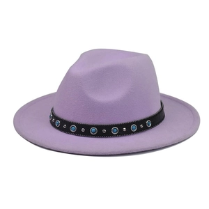 Detailed texture of lavender wool felt fedora with sapphire chain and silver studs