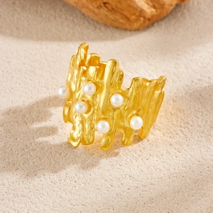Irregular lava texture gold plated stainless steel ring with white pearls for women