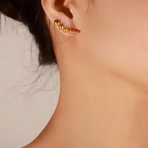 Minimalist gold titanium steel crawler earrings with six graduated round metal beads