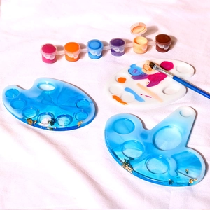 Artistic resin paint palette set with gold foil accents and painting tools kit