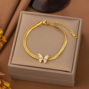 18K gold plated butterfly shell pendant bracelet on a luxury brown leather jewelry box