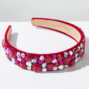 Detail of red velvet headband with sparkling heart crystals and anti-slip lining