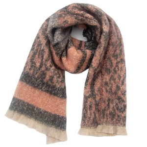 Close-up of leopard print scarf with orange and black tones and fringed edges