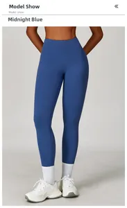 Detail of high waisted midnight blue yoga leggings with high elastic matte fabric