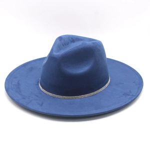 Detail of blue wide brim fedora hat featuring a triple-row silver rhinestone band decor