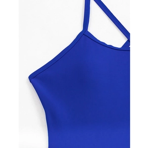 Close-up of royal blue swimsuit fabric with fine stitching and elastic texture