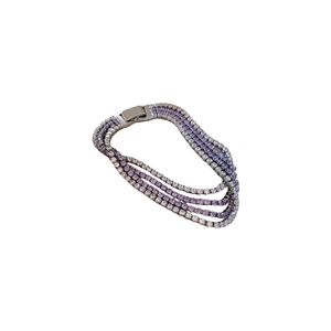 Four-layer multi-row zircon bracelet featuring purple and white stones in a sleek metal clasp