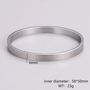 Silver minimalist hinged bangle showing 6mm width, 58x50mm inner size, and 23g weight