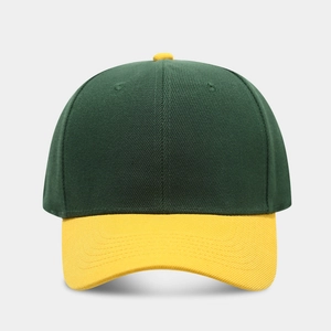 Detail of green and yellow baseball cap showing cotton twill fabric and stitching quality