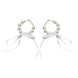 Elegant French style pearl hoop earrings with delicate white ribbon bows for women