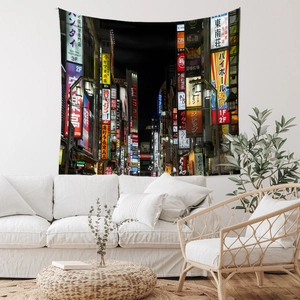 Detailed close-up of bohemian wall tapestry featuring a vibrant Japanese night city scene