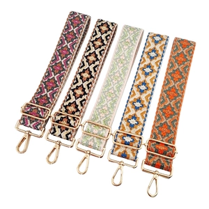Five colorful geometric woven replacement bag straps with golden metal swivel hooks