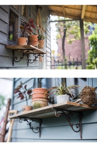 Detail of vintage cast iron bracket with ornate scrollwork supporting a wooden shelf