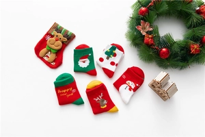 Christmas themed kids cotton socks set featuring festive holiday patterns and decorations