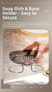 Detail of stable gold metal stand and transparent soap dish for bathroom storage