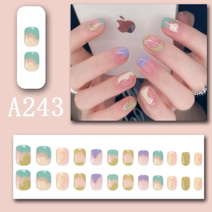 Macro detail of short square-oval nails with A243 abstract wavy patterns in Morandi tones