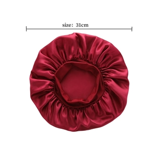 Detailed view of wine red satin sleep cap showing 31cm diameter size specifications