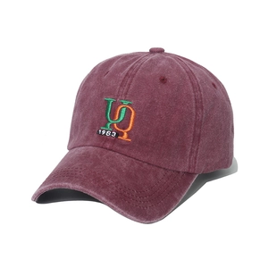 Vintage washed cotton baseball cap in deep red with 1983 embroidery and curved brim
