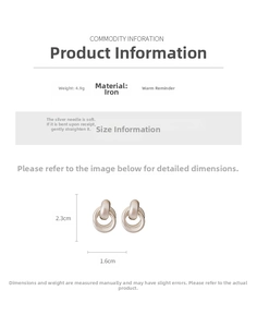 Detailed view of matte silver overlapping hoop earrings with specific size measurements