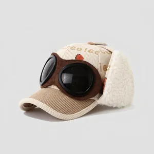 Detail of kids hip-hop baseball cap with goggles and warm lamb wool ear flaps