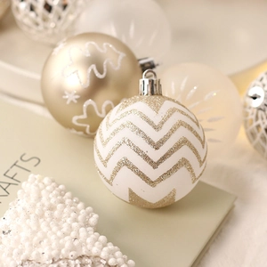 Champagne gold and white Christmas balls set with glitter geometric and snowflake patterns