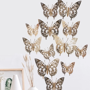 Set of 12 golden hollow butterfly wall stickers with 3D DIY metallic finish for home decor