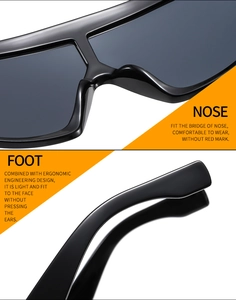 Detail of ergonomic nose pads and curved temples on black oversized sunglasses