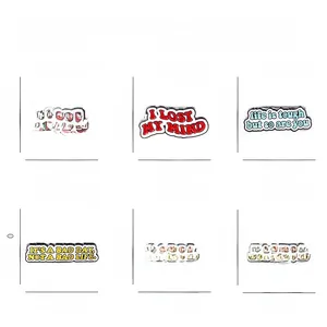 Enamel quote brooches set in eco-alloy with size and weight specs for each pin