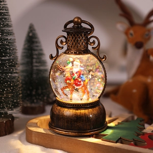 Detail of vintage bronze Christmas lantern with Santa riding a reindeer inside