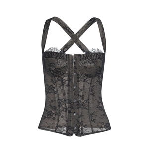 Detail of black floral lace corset top with front hook-and-eye closure and mesh texture