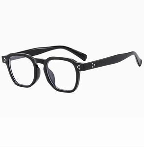 Detail of vintage square black glasses frame with classic triple dot metal rivets