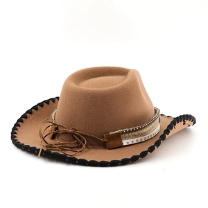 Detail of felt cowboy hat with braided edges and star-studded leather hatband decoration