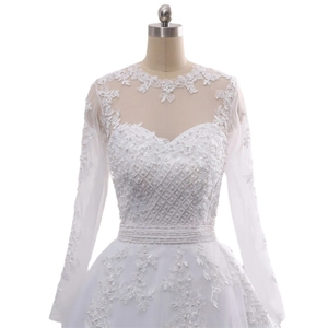 Elegant white long sleeve lace wedding dress with pearl beading and floral embroidery