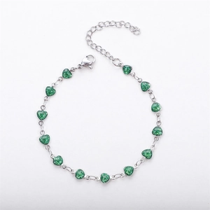 Silver tone heart bracelet with 13 green glitter beads and 18K gold plated chain
