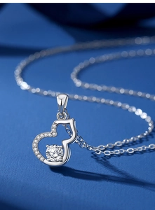 Macro shot of S925 sterling silver gourd pendant with sparkling moissanite stone