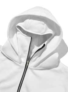 Detail of high-quality white knit fabric and silver zipper on hoodie neckline