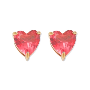Close-up of heart-shaped red zircon stud earrings in 18K gold-plated three-prong setting