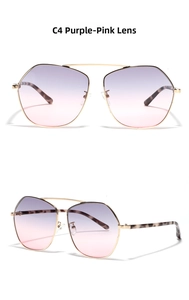 Detail of gold metal polygon frame sunglasses with purple gradient lenses and tortoiseshell tips