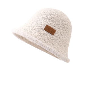 Winter fleece bucket hat in creamy white with premium leather patch and warm texture
