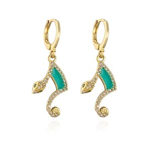 Detail of 18K gold plated snake earrings with green enamel and white zircon accents